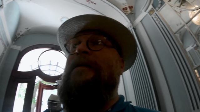 Video Reference: Facial hair, Eyewear, Head, Glasses, Moustache, Headgear, Beard, Fun, Cool, Selfie, Person, Man, Car, Looking, Wearing, Sitting, Front, Sunglasses, Hat, Standing, Seat, Holding, White, Phone, Human face, Face, Human beard, Clothing, Goggles