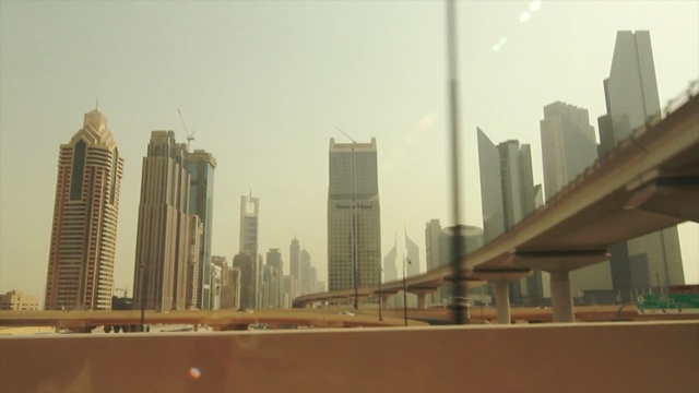 Video Reference: metropolitan area, skyscraper, skyline, metropolis, urban area, city, cityscape, building, tower block, haze, Person