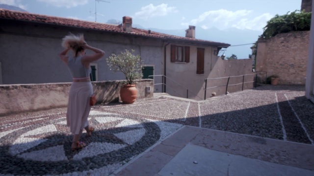 Video Reference: Photograph, Property, Roof, Residential area, Wall, Asphalt, Home, Road surface, House, Cobblestone