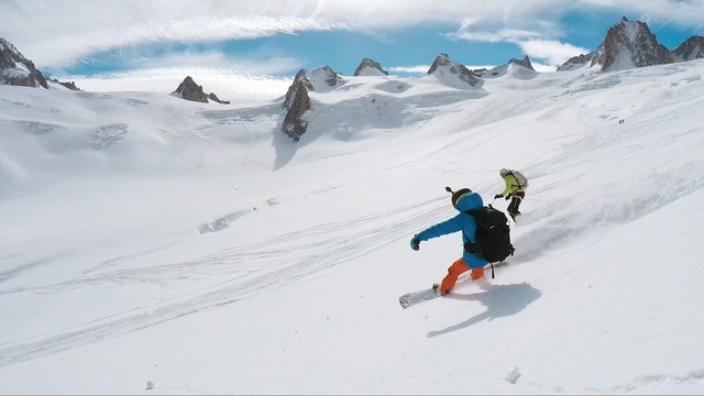 Video Reference: ski, snow, skier, winter, mountain, cold, slope, mountains, sport, ice, extreme, ski slope, sky, landscape, skiing, travel