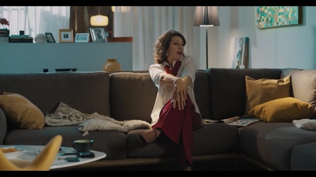 Video Reference: couch, furniture, room, sitting, girl, interior design, conversation, screenshot, drama, film, Person