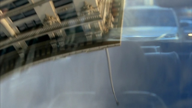 Video Reference: car, reflection, glass, mode of transport, water, motor vehicle, light, windshield, automotive exterior, window