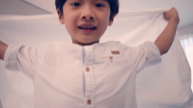 Video Reference: Facial expression, Child, Chin, Smile, Uniform, Cheek, Forehead, Gesture, Sleeve, Mouth