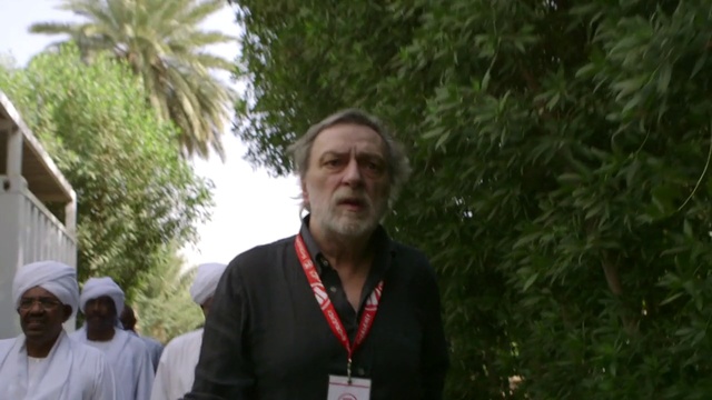 Video Reference: Photograph, Social group, People, Facial hair, Community, Beard, Male, Tree, Fun, Leaf