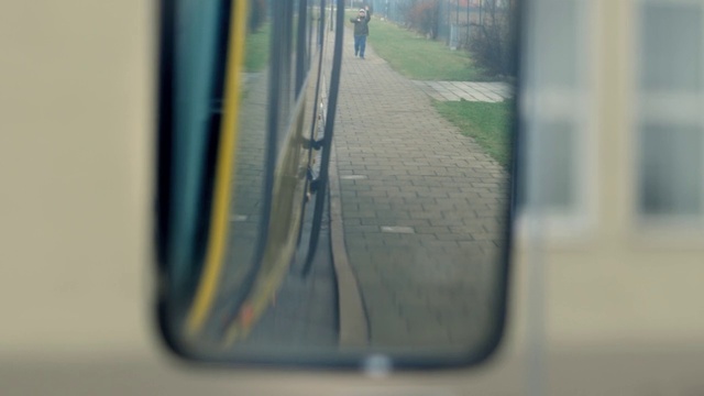 Video Reference: Mode of transport, Transport, Reflection, Line, Tree, Glass, Vehicle door, Auto part, Window, Rear-view mirror