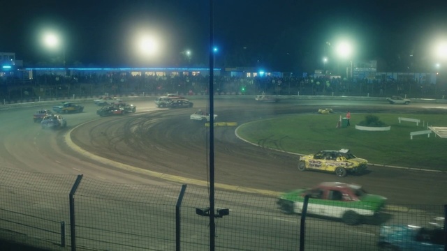 Video Reference: Race track, Sport venue, Light, Night, Racing, Motorsport, Lighting, Sky, Auto racing, Atmosphere