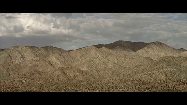 Video Reference: Mountainous landforms, Sky, Mountain, Hill, Highland, Cloud, Wilderness, Ecoregion, Badlands, Fell