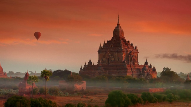 Video Reference: temple, palace, architecture, building, travel, religion, history, ancient, old, famous, tourism, city, church, tower, sky, culture, landmark, castle, structure, cathedral, Person