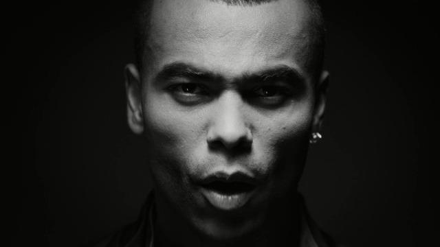 Video Reference: face, man, black, person, black and white, nose, chin, head, eyebrow, photography
