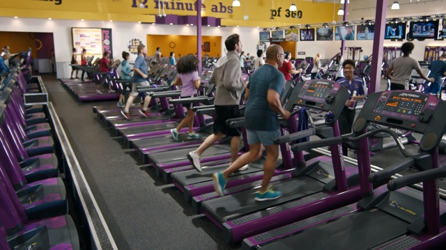 Video Reference: gym, sport venue, structure, room, exercise machine, physical fitness, leisure, leisure centre, exercise equipment, physical exercise, Person