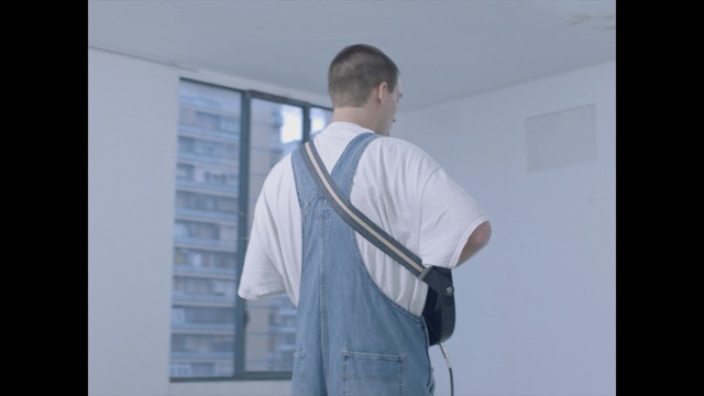 Video Reference: Shoulder, Joint, Standing, Arm, Neck, Outerwear, Human body, T-shirt, Sleeve, Elbow