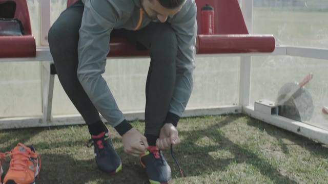 Video Reference: footwear, shoe, grass, vehicle, recreation, play, plant, lawn