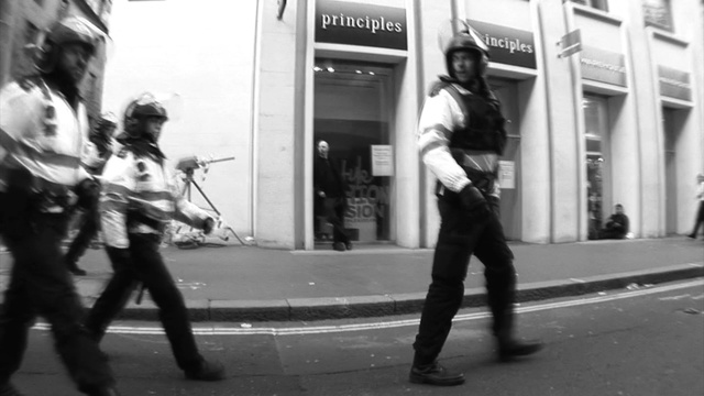 Video Reference: white, black, photograph, road, street, black and white, infrastructure, urban area, monochrome photography, pedestrian