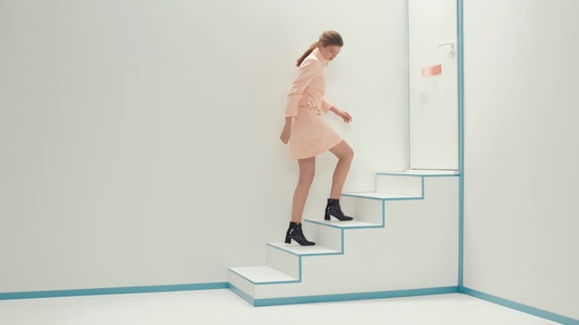 Video Reference: standing, shoulder, joint, shoe, floor, furniture, flooring, girl, neck, knee