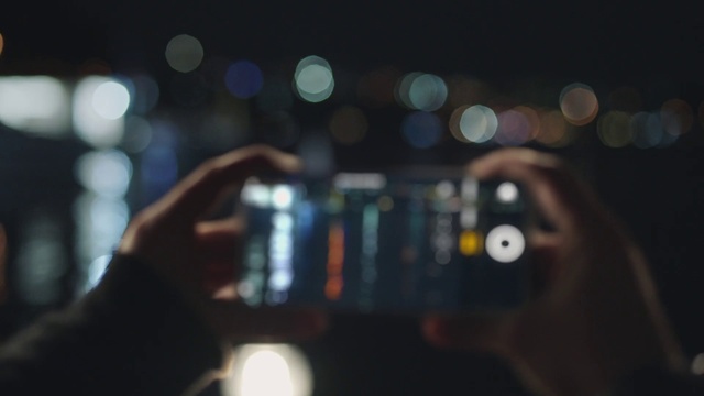 Video Reference: Light, Night, Sky, Darkness, Technology, Hand, Photography, Electronics, Auto part, Electronic device