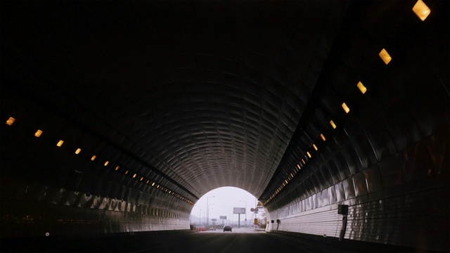 Video Reference: tunnel, infrastructure, fixed link, night, light, architecture, darkness, atmosphere, sky, daylighting, Person