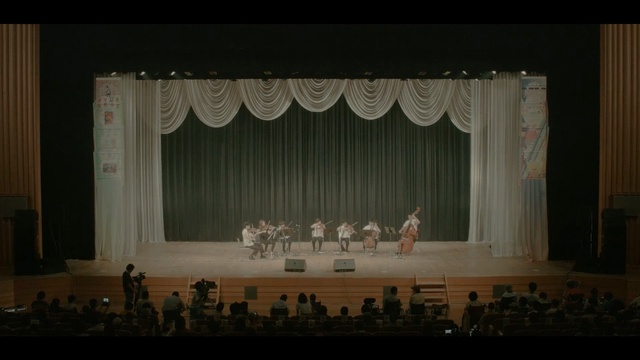 Video Reference: stage, theatre, auditorium, theatre, entertainment, curtain, opera, performance, theatrical scenery, scene, Person