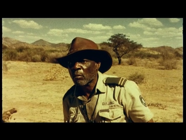 Video Reference: ecosystem, sky, landscape, cowboy, human behavior, screenshot, savanna, soil, film, ecoregion, Person