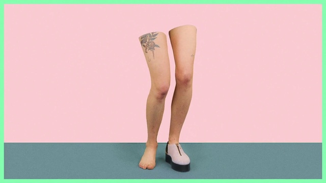 Video Reference: Human leg, Leg, Thigh, Joint, Knee, Calf, Pink, Ankle, Arm, Human body, Woman, Green, Girl, Standing, Female, Holding, Racket, Young, Posing, Ball, Player, Court, White, Room, Text, Legs, High heels, Sandal, Stomach, Feet, Toe, Limb, Footwear, Chest, Barefoot, Heel