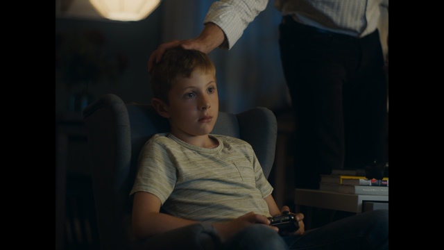 Video Reference: blue, person, sitting, girl, boy, snapshot, darkness, fun, child, eye