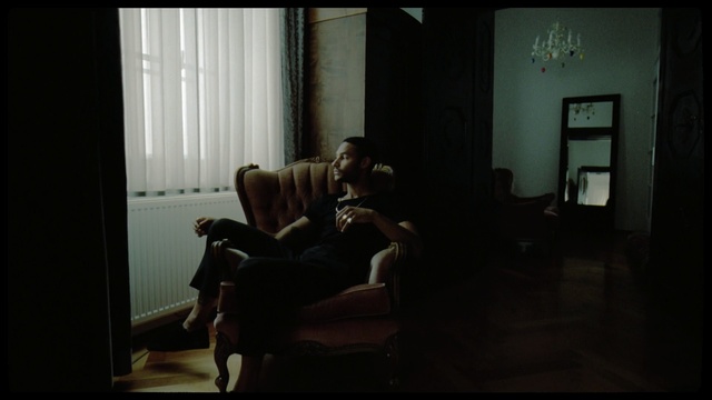 Video Reference: Photograph, Black, Room, Light, Snapshot, Couch, Darkness, Window, Furniture, Photography, Indoor, Dark, Sitting, Lit, Living, Table, Front, Small, White, Door, Television, Night, Screen, Large, Man, Bed, Mirror, Laying, Standing, Bedroom, Person, Chair, Sofa, Sleep, Sofa bed