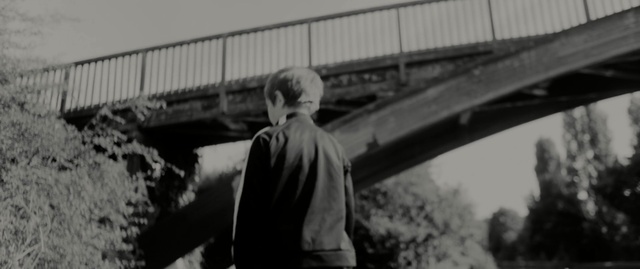 Video Reference: photograph, white, black, black and white, monochrome photography, landmark, urban area, mode of transport, structure, infrastructure