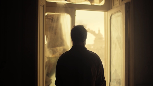 Video Reference: Light, Backlighting, Male, Standing, Shadow, Human, Sky, Sunlight, Room, Window, Person
