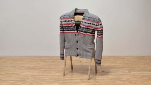 Video Reference: Clothing, Outerwear, Sweater, Woolen, Cardigan, Wool, Sleeve, Beige, Jacket, Pattern, Person