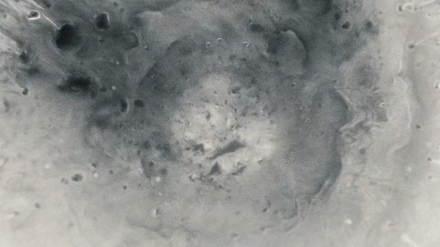 Video Reference: impact crater, freezing, Person
