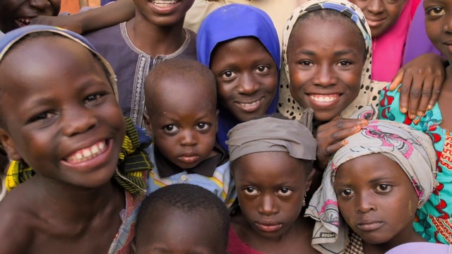 Video Reference: People, Facial expression, Child, Smile, Community, Adaptation, Happy, Fun, Event, Tribe