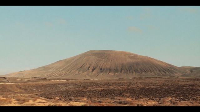 Video Reference: sky, ecosystem, hill, soil, plateau, ecoregion, landscape, desert, highland, aeolian landform