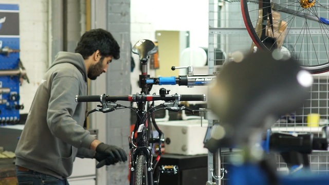 Video Reference: filmmaking, technology, machine, engineering, factory, bicycle, Person