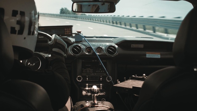 Video Reference: car, motor vehicle, vehicle, automotive design, family car, luxury vehicle, center console, steering wheel, Person