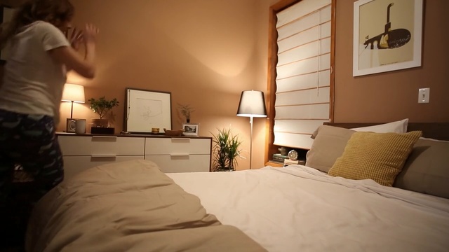 Video Reference: room, bedroom, furniture, home, bed, interior design, suite, comfort, house, mattress, Person