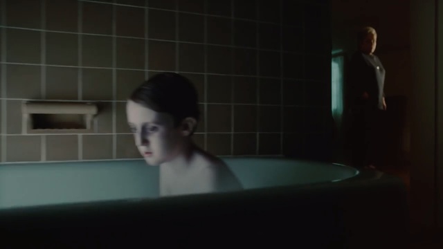 Video Reference: black, green, photograph, white, person, darkness, room, girl, lady, light