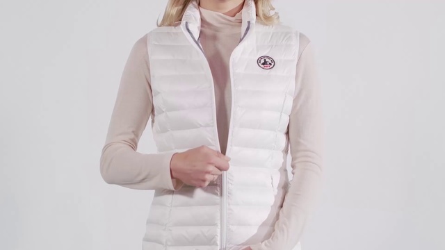 Video Reference: White, Clothing, Outerwear, Sleeve, Pink, Collar, Neck, Jacket, Uniform, Coat