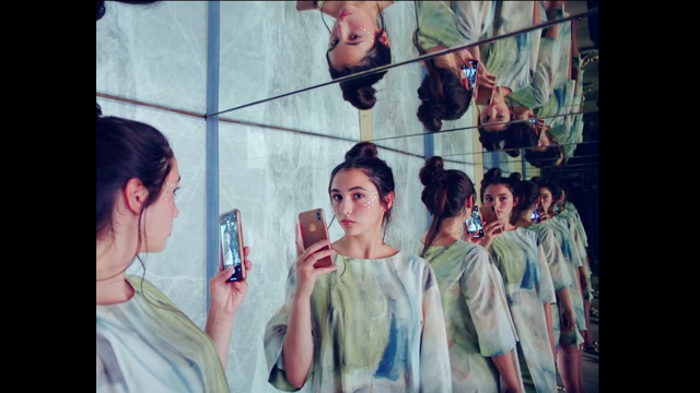 Video Reference: Art, Visual arts, Painting, Photography, Illustration, Portrait, Style, Modern art, Watercolor paint, Person, Man, Photo, Looking, Holding, Front, Standing, Woman, Wearing, People, Group, Display, Young, Suit, Phone, Store, Mirror, White, Train, Human face, Clothing, Girl