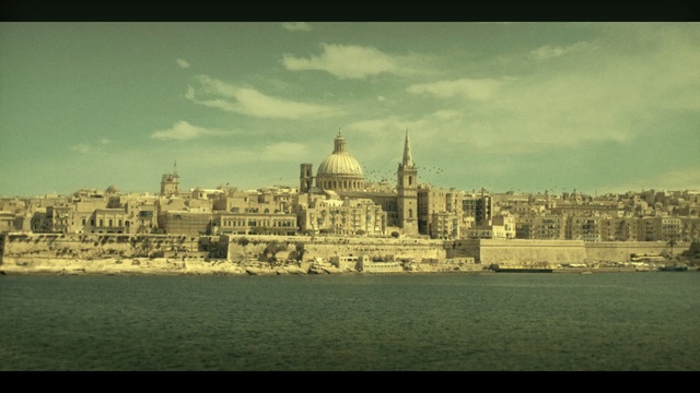 Video Reference: sky, landmark, skyline, city, daytime, stately home, palace, cityscape, cloud, grass