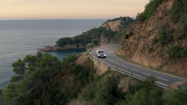 Video Reference: Road, Coast, Headland, Coastal and oceanic landforms, Geological phenomenon, Terrain, Cliff, Infrastructure, Mountain pass, Highland
