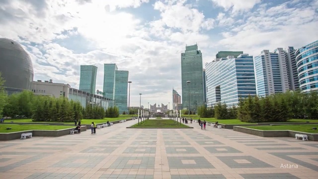 Video Reference: metropolitan area, urban area, landmark, daytime, city, skyscraper, urban design, neighbourhood, tower block, sky, Person