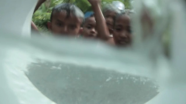 Video Reference: water, fun, bathing, leisure, mouth, girl, water resources, vacation, water feature, hot tub, Person