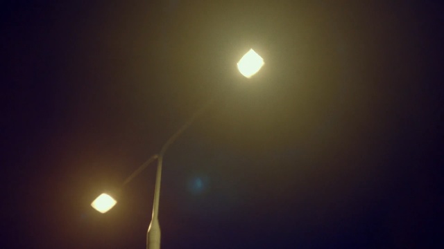 Video Reference: Street light, Lighting, Light, Light fixture, Atmospheric phenomenon, Sky, Night, Lens flare, Darkness, Floodlight