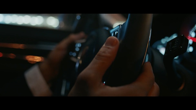 Video Reference: Hand, Audio equipment, Nail, Finger, Photography, Mouth, Driving, Black hair, Darkness, Person