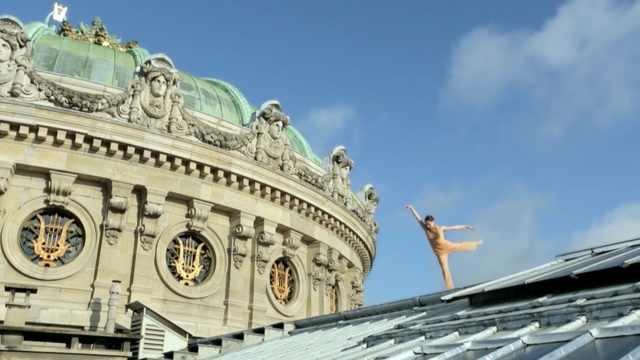 Video Reference: landmark, sky, building, tourist attraction, tourism, historic site, facade, dome, metropolis, outdoor structure, Person