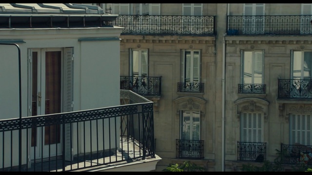 Video Reference: Iron, Building, Property, Balcony, Architecture, House, Facade, Urban area, Real estate, Neighbourhood