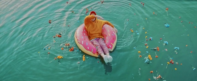 Video Reference: Water, Pink, Organism, Fun, Recreation, Leisure, Reflection, Art, Swimming, Child, Large, Little, Riding, Skiing, Girl, Small, Ocean, Kite, Young, Playing, Floating, Boy, People, Dog, Man, Boat, Clear, Ball, Group