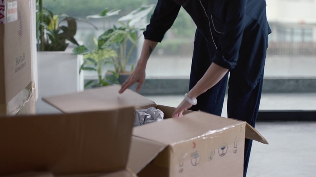 Video Reference: Table, Hand, Box, Furniture, Desk, Architecture, Package delivery, Carton, Cardboard