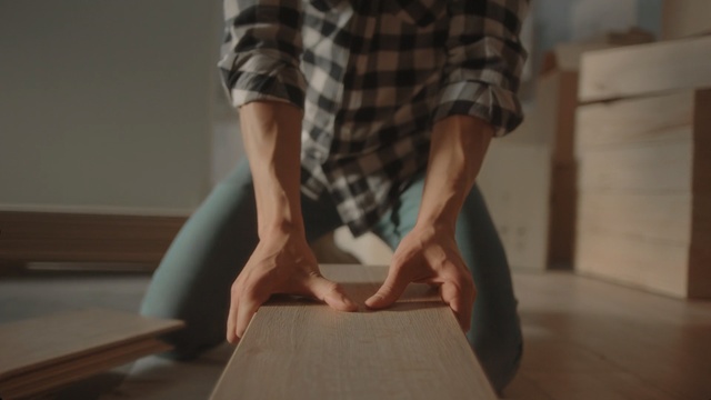 Video Reference: Floor, Joint, Leg, Arm, Hand, Shoulder, Flooring, Human body, Table, Sitting
