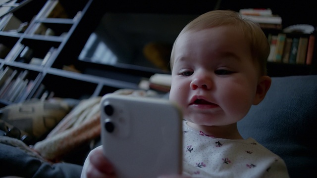 Video Reference: Child, Baby, Face, Cheek, Skin, Facial expression, Nose, Head, Chin, Product