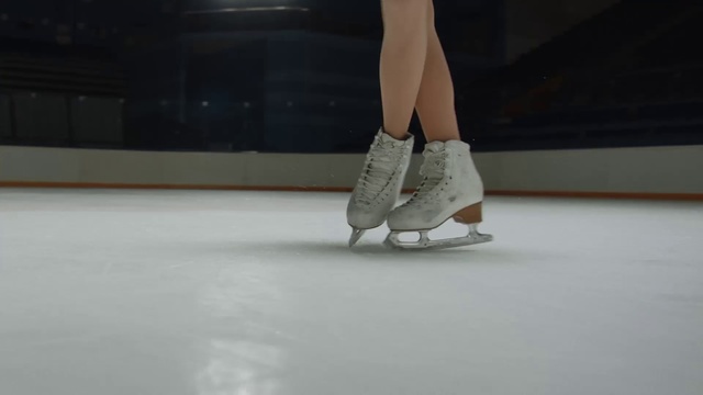 Video Reference: Figure skate, Ice skating, Ice rink, Ice skate, Footwear, Skating, Figure skating, Leg, Shoe, Ankle